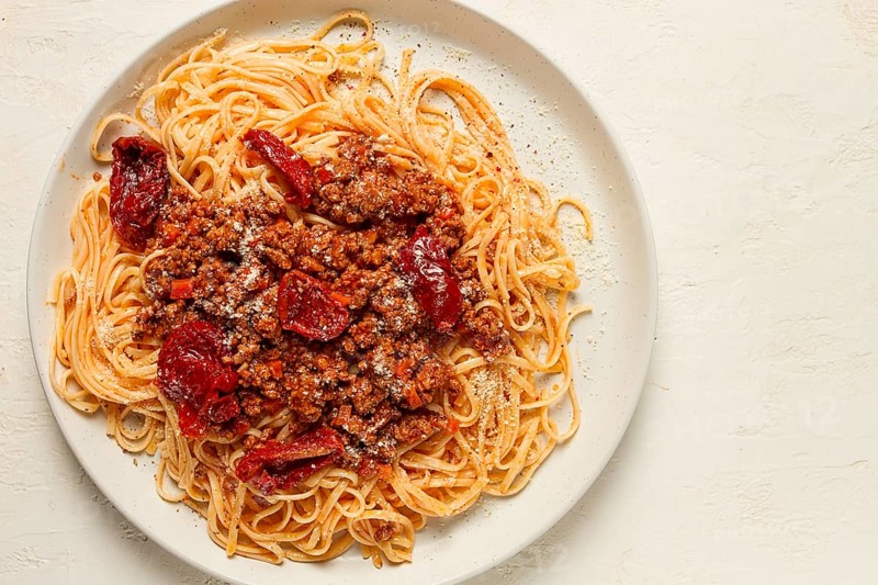 Spaghetti bolognese, with dried tomatoes, homemade, close-up