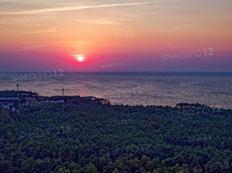Sunset over the Baltic Sea at the Slowinski National Park, Slowinski Park Narodowy, in northern Poland. The area has been a UNESCO biosphere reserve since 1977. Rowy, Slupka, Pomerania, Poland, Europe