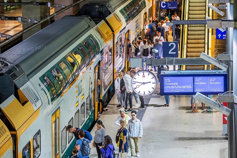 Platform with passengers, Gesundbrunnen station with ODEG regional train. Berlin, Germany, Europe