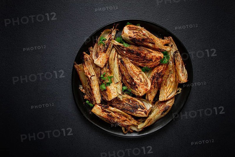 Baked, oven-baked fennel, with spices, in olive oil, homemade, no people