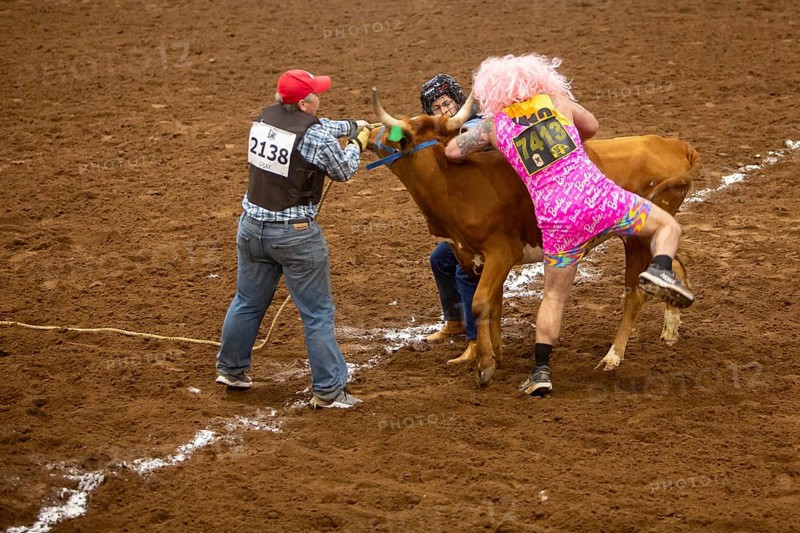 Oklahoma City, Oklahoma, The Great Plains Rodeo, an annual gay rodeo that features traditional rodeo competition while emphasizing the camaraderie of the LGBTQ community. In Wild Drag Racing three people must pull a steer across a while line and then the competitor in drag must ride it back across the line