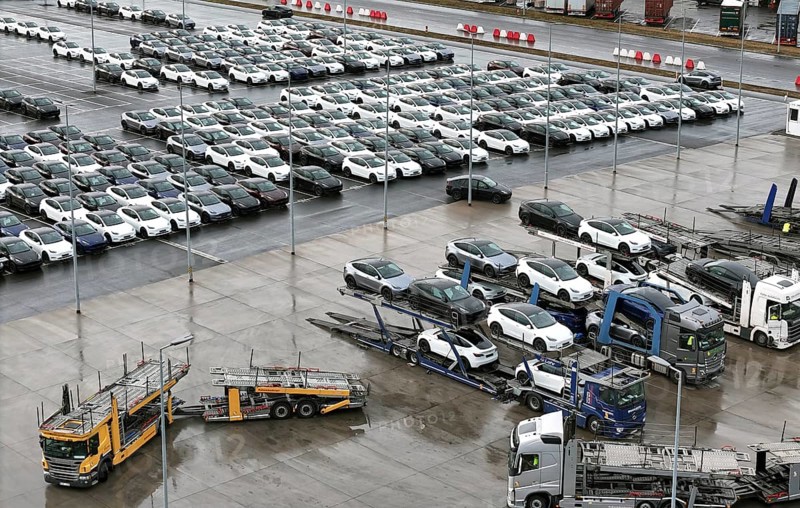 Tesla Y new cars are loaded onto car transporters at the Tesla Giga Factory, Grünheide, 25.09.2024., Grünheide, Brandenburg, Germany, Europe