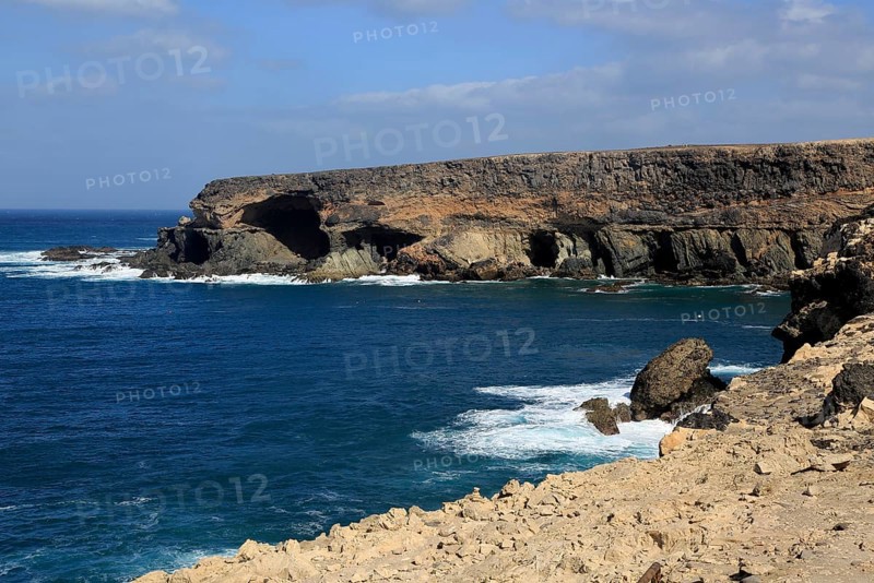 Headland with caves being eroded by waves, Ajuy, Fuerteventura, Canary Islands, Spain, Europe