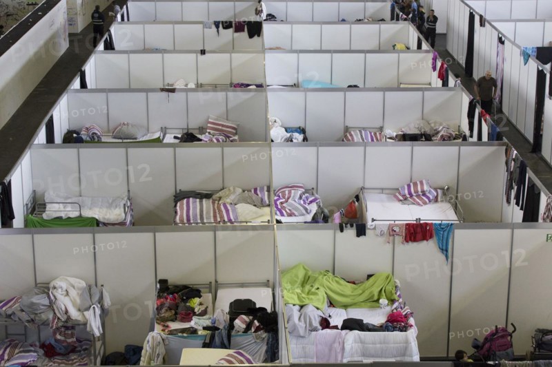 Temporary rooms with beds are set up in an emergency shelter for refugees on 9 December 2015 in a former hangar at Tempelhof Airport, Berlin, Berlin, Germany, Europe