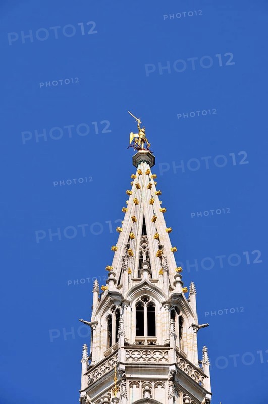Gilded statue of the Archangel Michael fighting the dragon, the patron saint of the city of Brussels, on the 96 metre high late Gothic Belfry, City Hall, Grand Place, Brussels, Belgium, Benelux, Europe