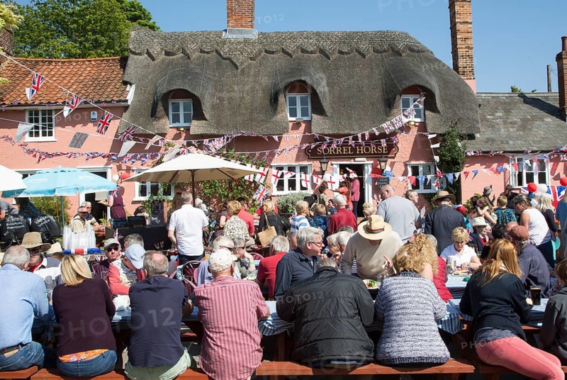 Street party celebrating royal wedding of Prince harry and Meghan Markle, Sorrel Horse Suffolk, England, UK May 19, 2018 Duke and Duchess of Sussex