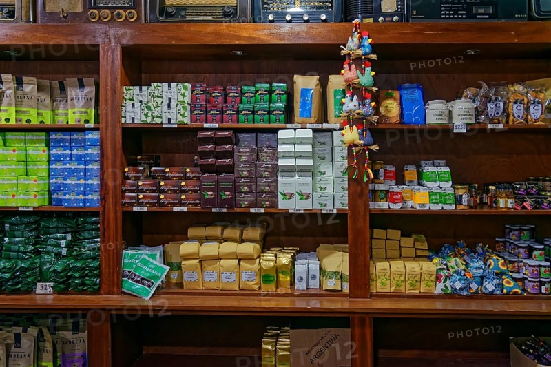 An assortment of different tea products on wooden shelves in a shop, tea cultivation and production Cha Gorreana near Sao Bras, Sao Miguel, Azores, Portugal, Europe