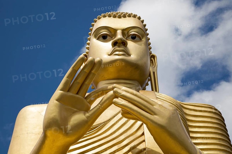 Giant Golden Buddha statue at Dambulla cave temple complex, Sri Lanka, Asia