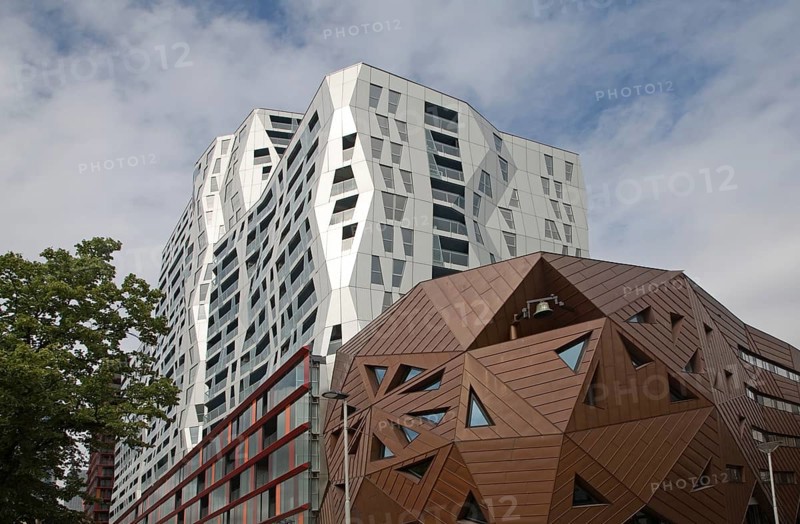 Modern architecture Nieuwe Pauluskerk, Rotterdam, Netherlands, opened June 2013 designed by British architect Will Alsop. The church is part the Calypso mixed use urban development project which includes 408 apartments, 500 covered parking spaces, and 6, 500 square meters of commercial space