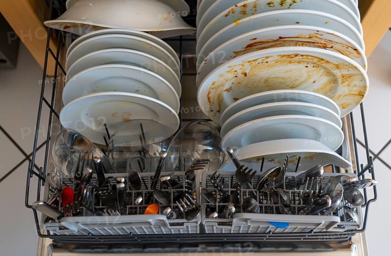 Dishwasher, full of dirty crockery