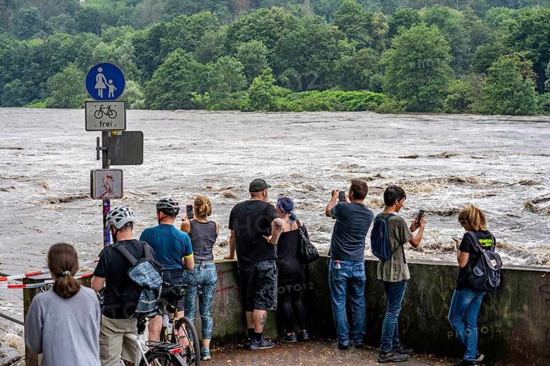 Weir of the Lake Baldeney in Essen, the masses of water roar through the open weirs, spectators, onlookers, high water on the Ruhr, after long heavy rains the river came out of its bed and flooded the landscape and villages, the highest water level ever measured, North Rhine-Westphalia, Germany, Europe