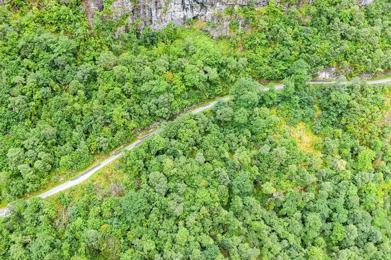 Aerial view of road above lake Lovatnet (or: Loenvatnet), valley Lodalen south of village Loen, Norway, Europe