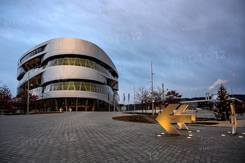 Mercedes-Benz Museum, Stuttgart, Baden-Württemberg, Germany, Europe, Futuristic building with illuminated signposts in the evening, Europe
