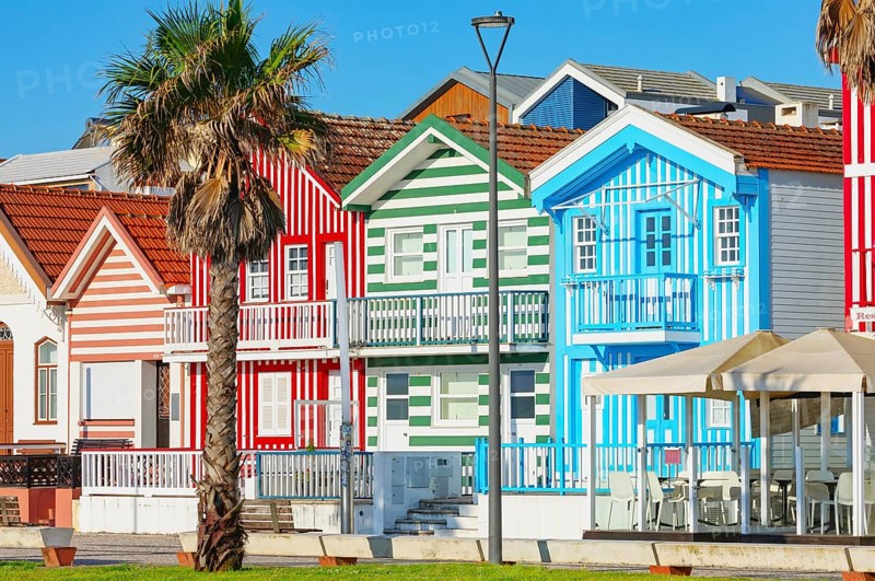 Brightly painted beach homes, Costa Nova do Prado, Aveiro, Portugal, Europe