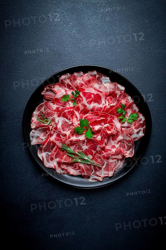 Sliced cured ham, prosciutto, italian dish, delicacy, parma ham, top view, no people