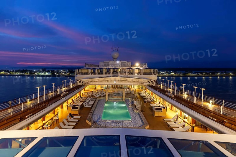 Cruise ship at sunset on vacation around Caribbean islands and Panama Canal in Central America