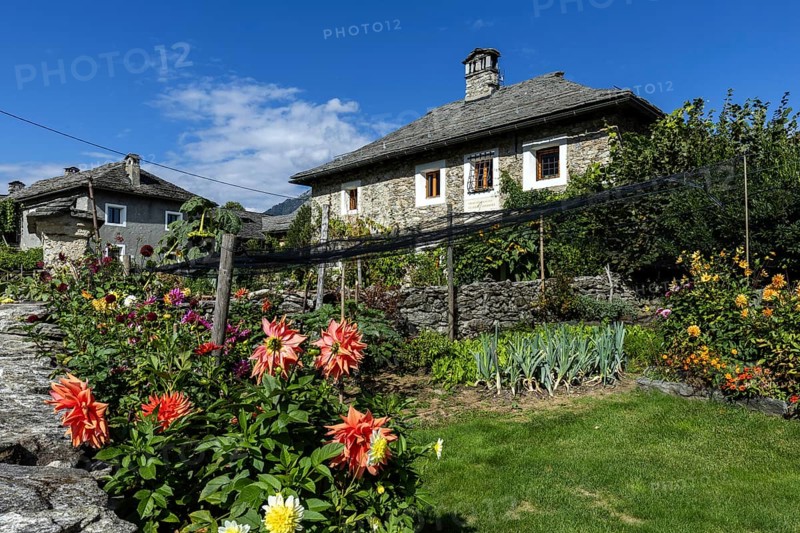 View of the village, typical Ticino stone houses in the mountain village of Rasa, Centovalli, Canton Ticino, Switzerland, Europe