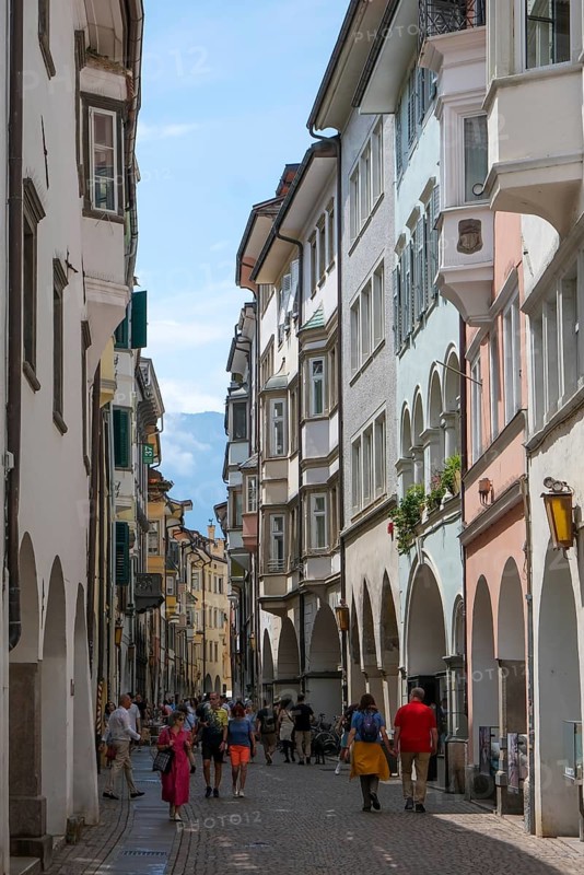 Bolzano, South Tyrol, Italy, Passers-by stroll through the Laubengasse in the old town centre, Europe