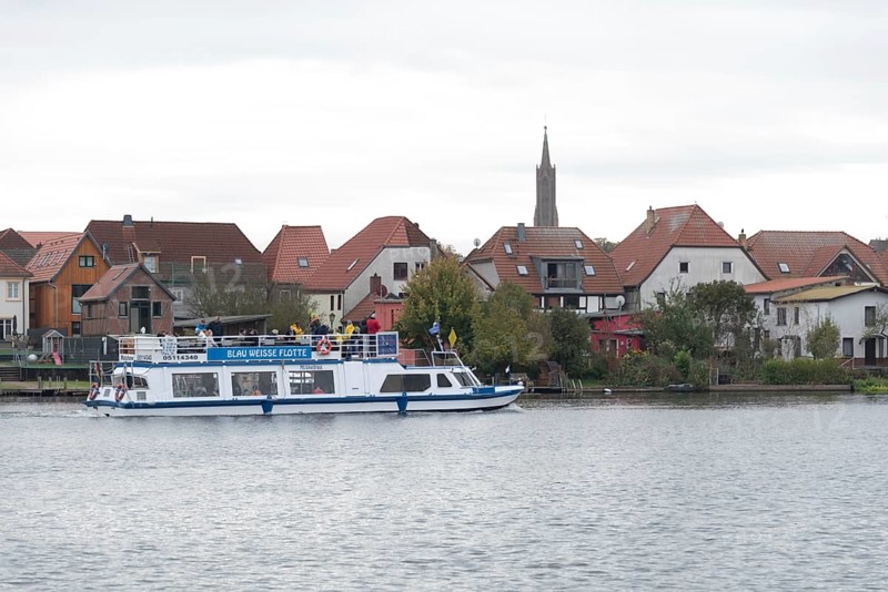 A passenger ship of the Blau Weiße Flotte shipping company is travelling on Lake Malchow, Malchow, Mecklenburg-Vorpommern, Germany, Europe