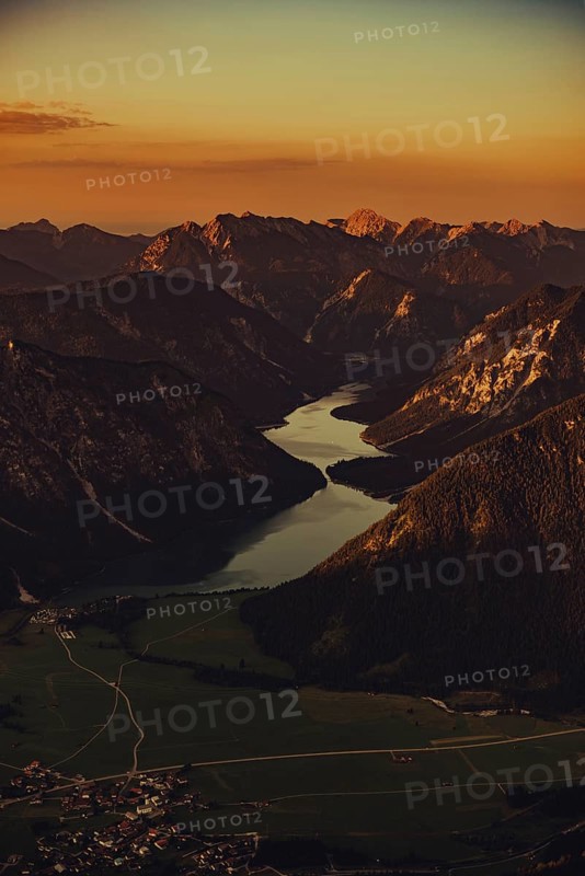 Thaneller summit at sunset in the Lechtal valley in Tyrol with a wonderful view of the surrounding mountains. Tyrol, Austria, Europe