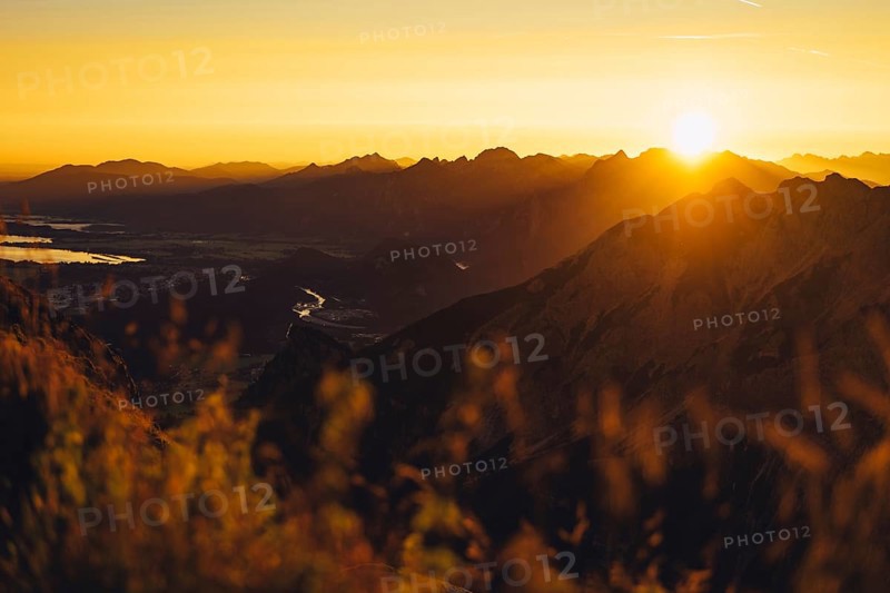 View from the Aggenstein and the foothills of the Alps in Ostallgäu and the Ammergebirge at sunrise, Bavaria, Germany, Europe