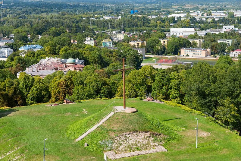 Large wooden cross on a green hill above the urban landscape, Wysoka Górka, Wysoka Gorka, Chelmska Hill, Chelmska, Jubilee Cross on the Independence Hill, Chelm, Chelm, Cholm, Lublin Voivodeship, Poland, Europe