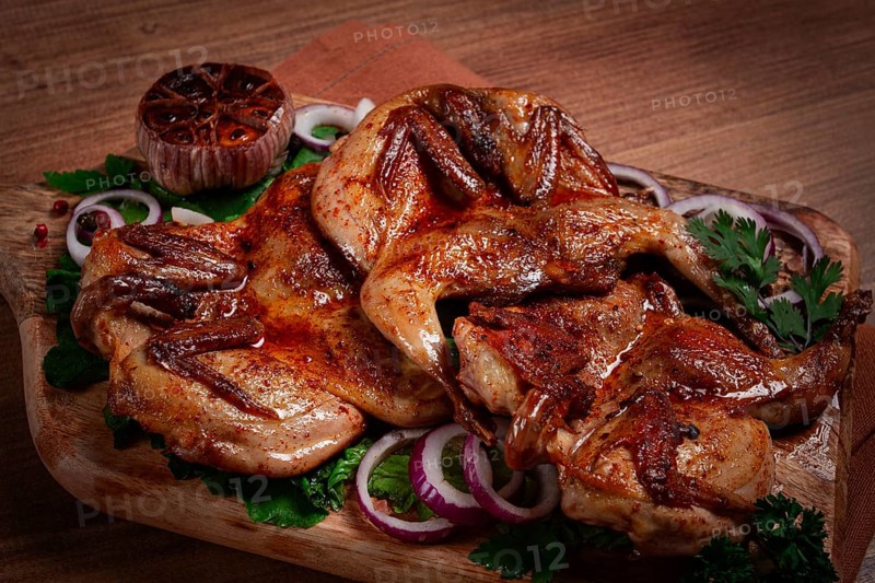 Fried, quail meat, tobacco (tapaka), with spices, homemade, no people