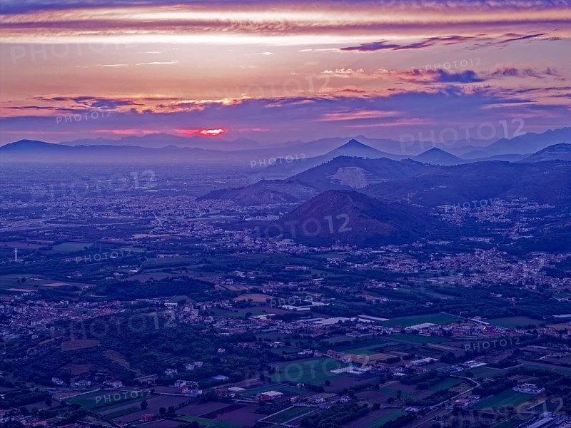 View of the densely populated Neapolitan region and the mountains near Caserta at dusk. San Felice a Cancello, Caserta, Campania, Italy, Southern Europe, Europe