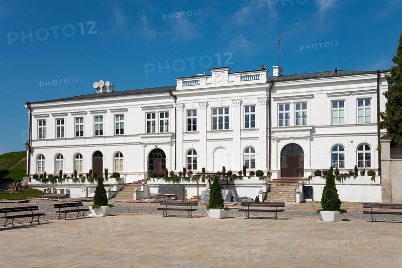 White, symmetrical building with architectural details, building near the Basilica of the Nativity of the Virgin Mary, Chelm, Chelm, Cholm, Lublin Voivodeship, Poland, Europe