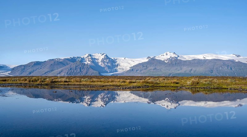 Lake with reflection, view of glacier tongues Skaftafellsjökull and Svínafellskökull, glaciated mountain peak Hrútfjallstindar and mountain Kristínartindar, Vatnajökull National Park, Austurland, Iceland, Europe
