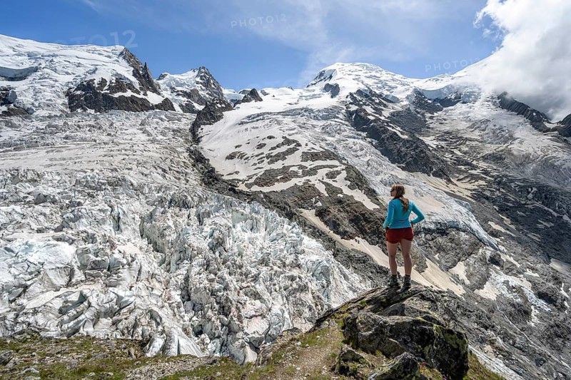 Mountaineer on the glacier, High alpine glaciated mountain landscape, La Jonction, Glacier des Bossons meets Glacier de Taconnaz, Summit of Mont Maudit and Mont Blanc, Chamonix, Haute-Savoie, France, Europe