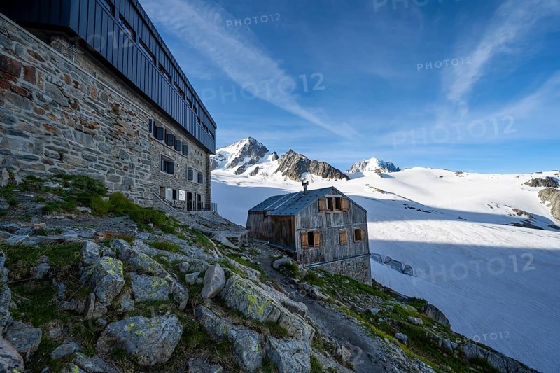 Old and new mountain hut Refuge Albert 1er, high alpine mountain landscape, summit of the Aiguille de Chardonnet and Glacier du Tour, glacier and mountain peaks, Chamonix, Haute-Savoie, France, Europe