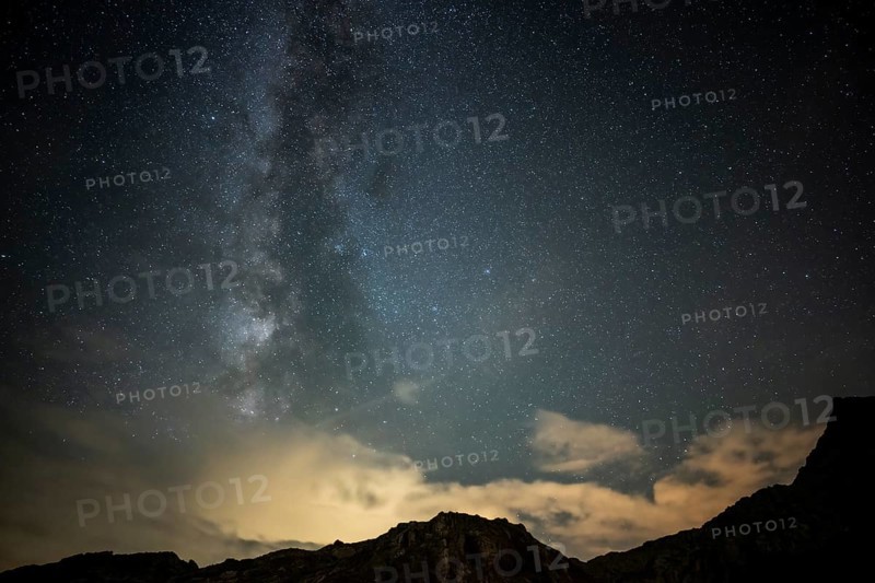 Milky Way and starry sky with Montafon mountains, Tschagguns, Rätikon, Montafon, Vorarlberg, Austria, Europe