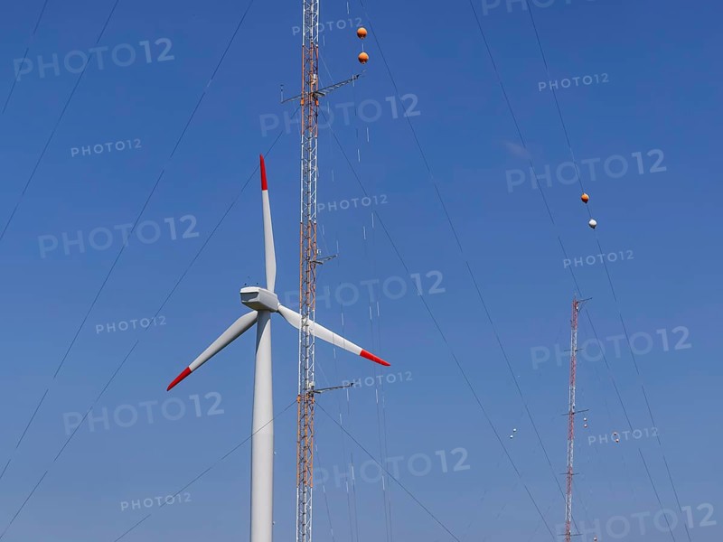 WINSENT test facility, research into wind power at high altitudes. In a research project, scientists in the Swabian Alb are investigating how wind turbines can be used efficiently under harsh conditions in mountainous regions. Two test wind turbines are fully equipped with measurement technology, flanked by four meteorological measuring masts. Geislingen an der Steige, Baden-Württemberg, Germany, Europe