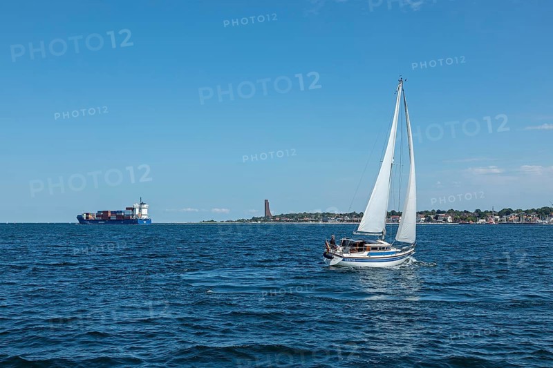Container ship, sailing boat, naval memorial, Laboe, Schleswig-Holstein, Germany, Europe