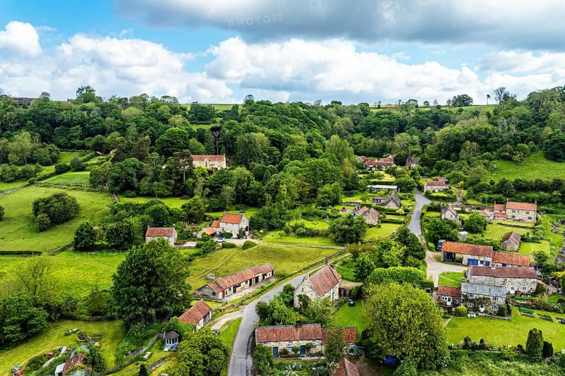 Farms and Fields over Rievaulx Village from a drone, North York Moors National Park, North Yorkshire, England, United Kingdom, Europe