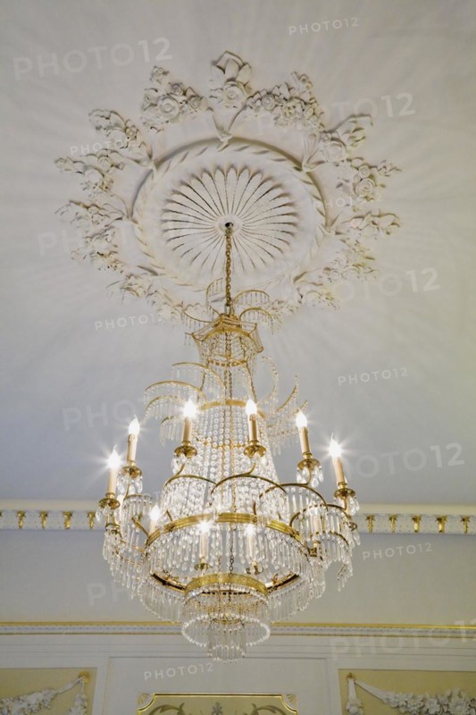 Lit candle style chandelier in the Frederic Chopin Museum building, Warsaw, Poland, Europe
