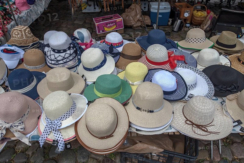 Market stall with straw hats for ladies, at the weekly market market, market square, Wismar, Mecklenburg-Vorpommern, Germany, Europe