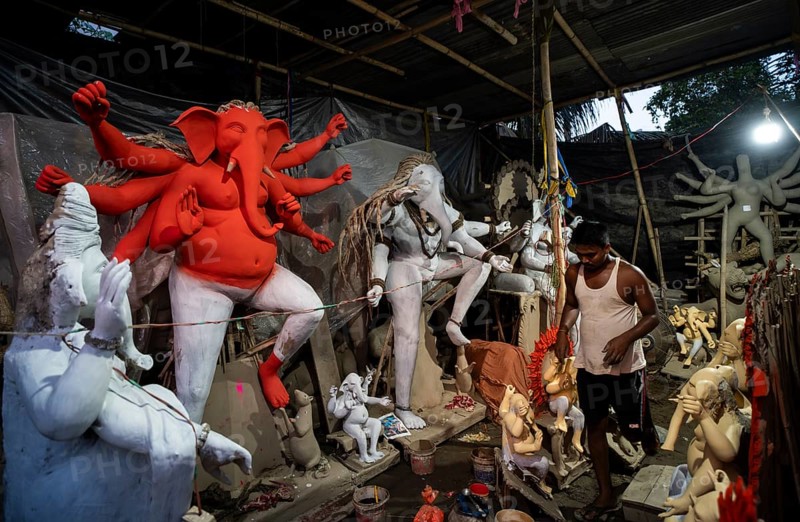 Guwahati, India. 4 September 2024. Artisan work on idols of the elephant-headed Hindu deity Ganesha at a workshop ahead of the Ganesh Chaturthi festival, in Guwahati