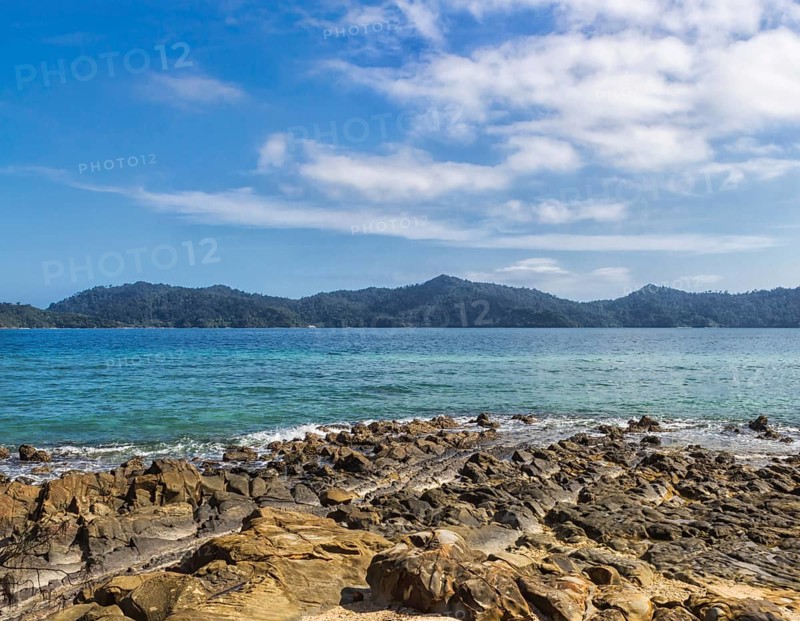 Rocky beach on a tropical island in marine park.Malaysia