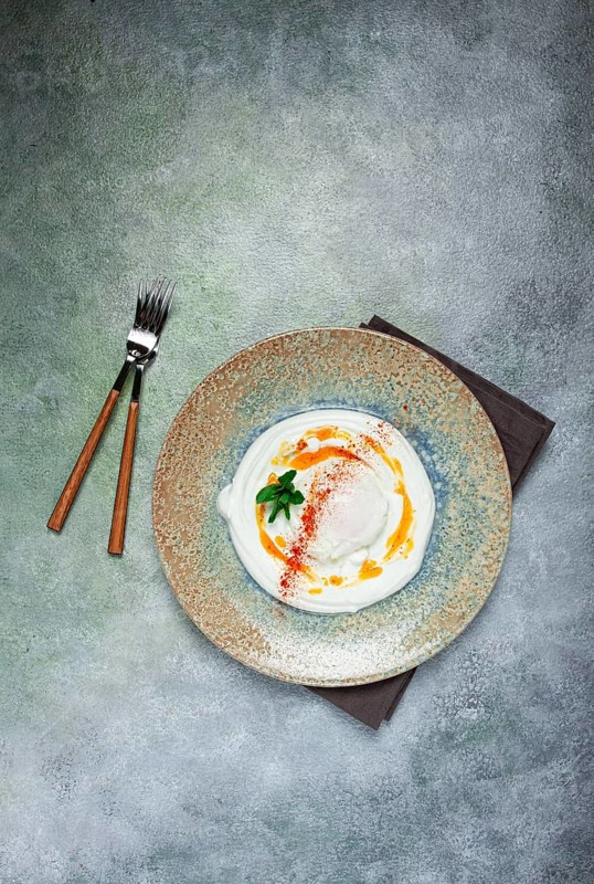 ?ilbir, traditional Turkish breakfast, Turkish eggs with yogurt and butter, homemade, no people