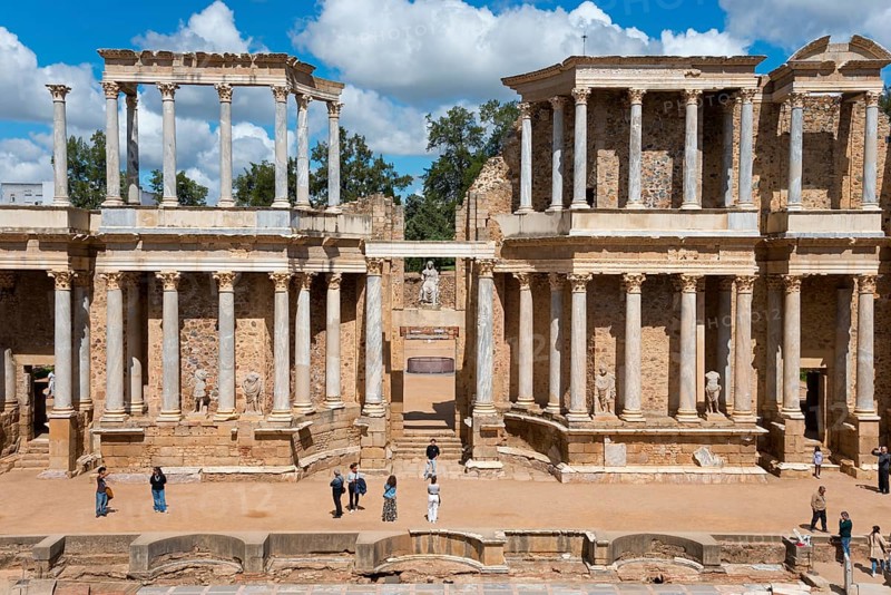 Front view of an ancient Roman building with columns, people exploring the historic site in fine weather, Teatro Romano de Mérida, Roman theatre of Merida, Merida, Badajoz, Extremadura, Spain, UNESCO World Heritage Site, Europe