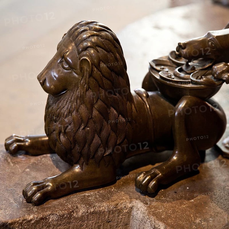 Bronze lion figure at the foot of the seven-armed candelabrum, Braunschweig Cathedral, Cathedral Church of St Blasii, Lower Saxony, Germany, Europe