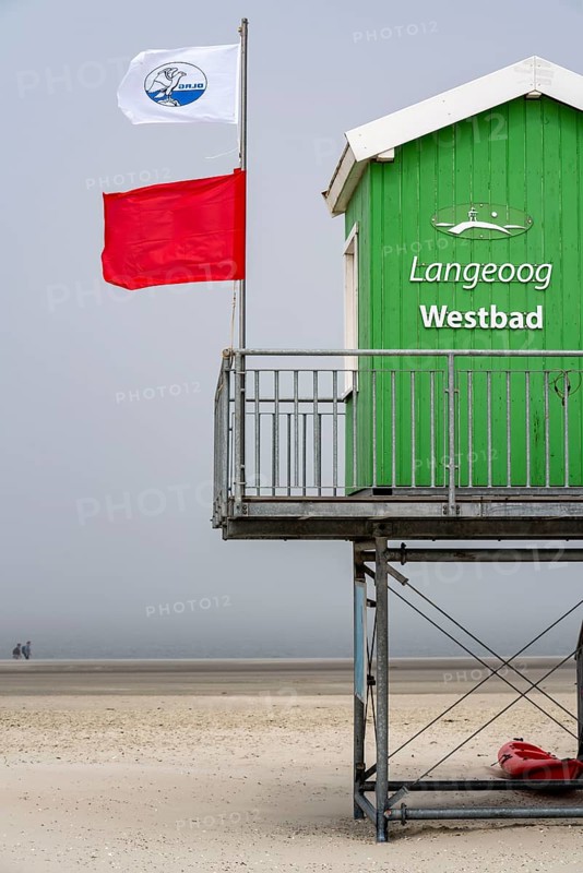 North Sea island of Langeoog, early summer, shortly after the first easing of the lockdown in the Corona crisis, foggy weather, still quite few tourists on the beach, DLRG watchtower, Lower Saxony, Germany, Europe
