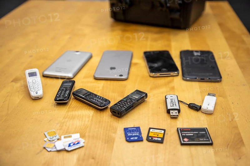Data storage media, found by a data storage sniffer dog of the North Rhine-Westphalia police, here in a training flat, training institute, the dogs can sniff out data storage media such as USB sticks, hard drives, memory cards, Neuss, North Rhine-Westphalia, Germany, Europe