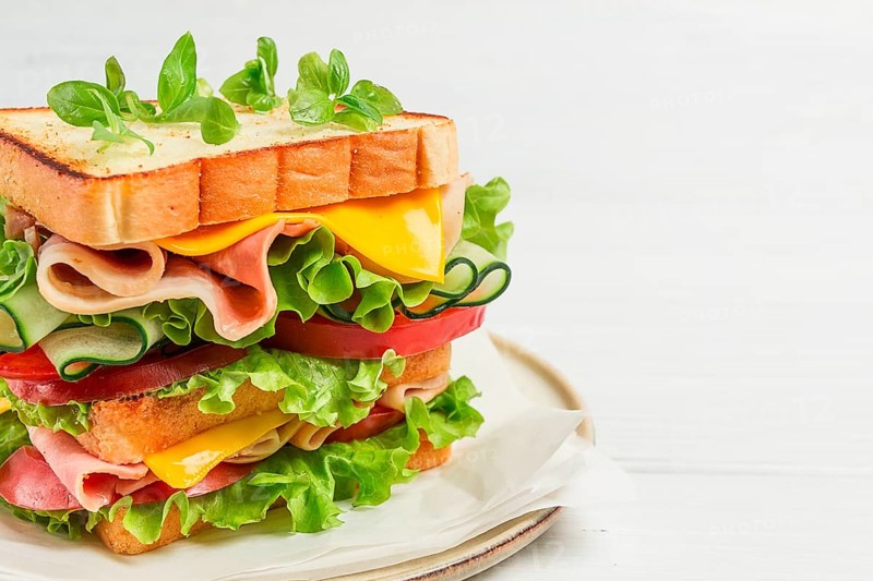 Club sandwich, on a white table, close-up, no people, horizontal, homemade