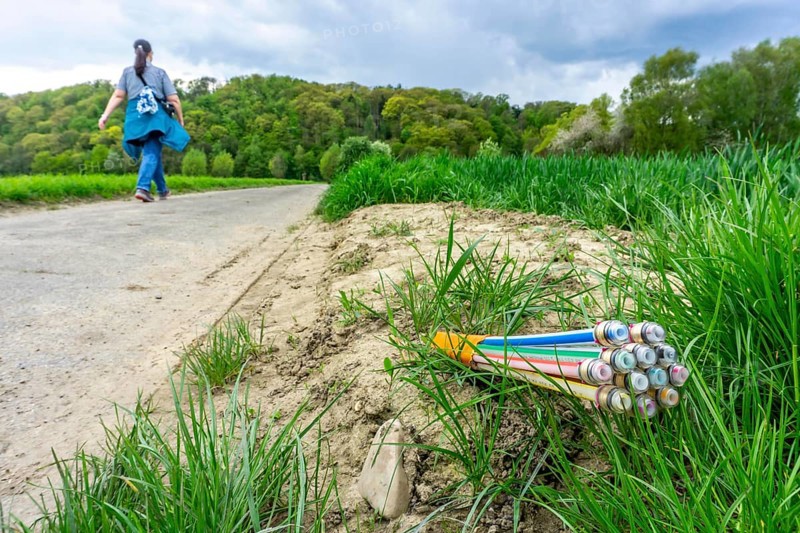 Fibre optic cable, freshly laid along a dirt road, provision of high-speed Internet in rural areas, Mülheim an der Ruhr, North Rhine-Westphalia, Germany, Europe