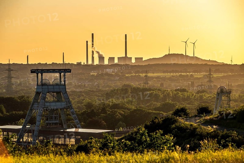 EON coal-fired power station Scholven, Gelsenkirchen, in the back, in front the double headframe of the disused Ewald mine in Herten, North Rhine-Westphalia, Germany, Europe
