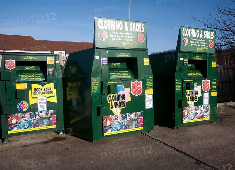 Clothing and Shoe recycling collection containers at a Tesco store, UK