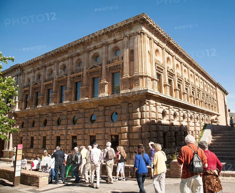Tour group of tourists outside the Palacio de Carlos V, Palace of King Charles the Fifth, the Alhambra complex, Granada, Spain, Europe